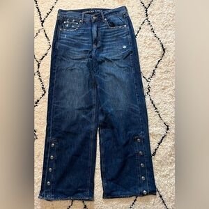 American Eagle skater jeans w/ snap leg embellishment. Size 8R rigid denim NWOT